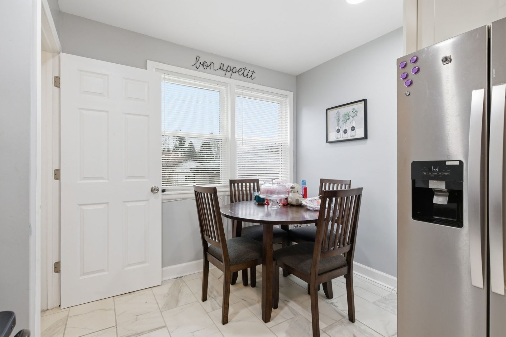 1036 West 105th Street Chicago, IL 60643 - Photo 10 of 30 a view of a dining room with furniture