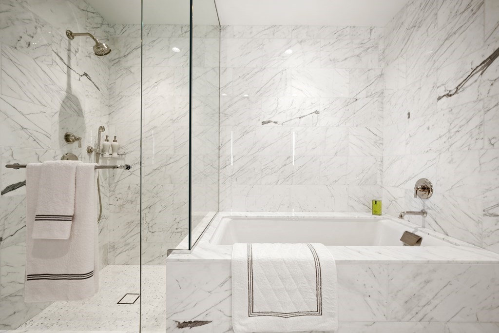 240 Devonshire Street, Unit 3603 Boston, MA 02110 - Photo 12 of 41 a bathroom with a bathtub and a shower