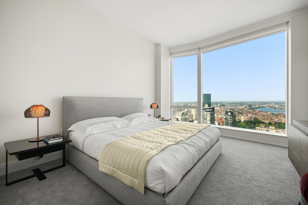240 Devonshire Street, Unit 3603 Boston, MA 02110 - Photo 9 of 41 a bedroom with a bed and a lamp