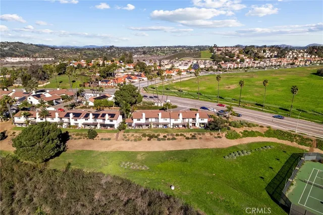 a view of a city with mountains in the background