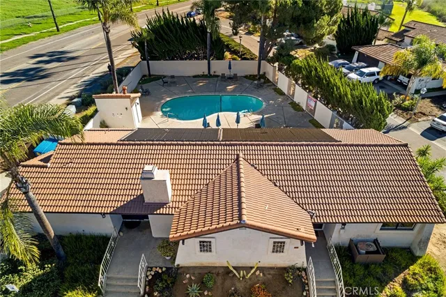 an aerial view of a house with garden