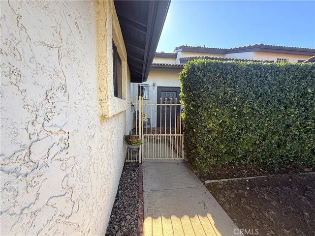 a view of a house with a street