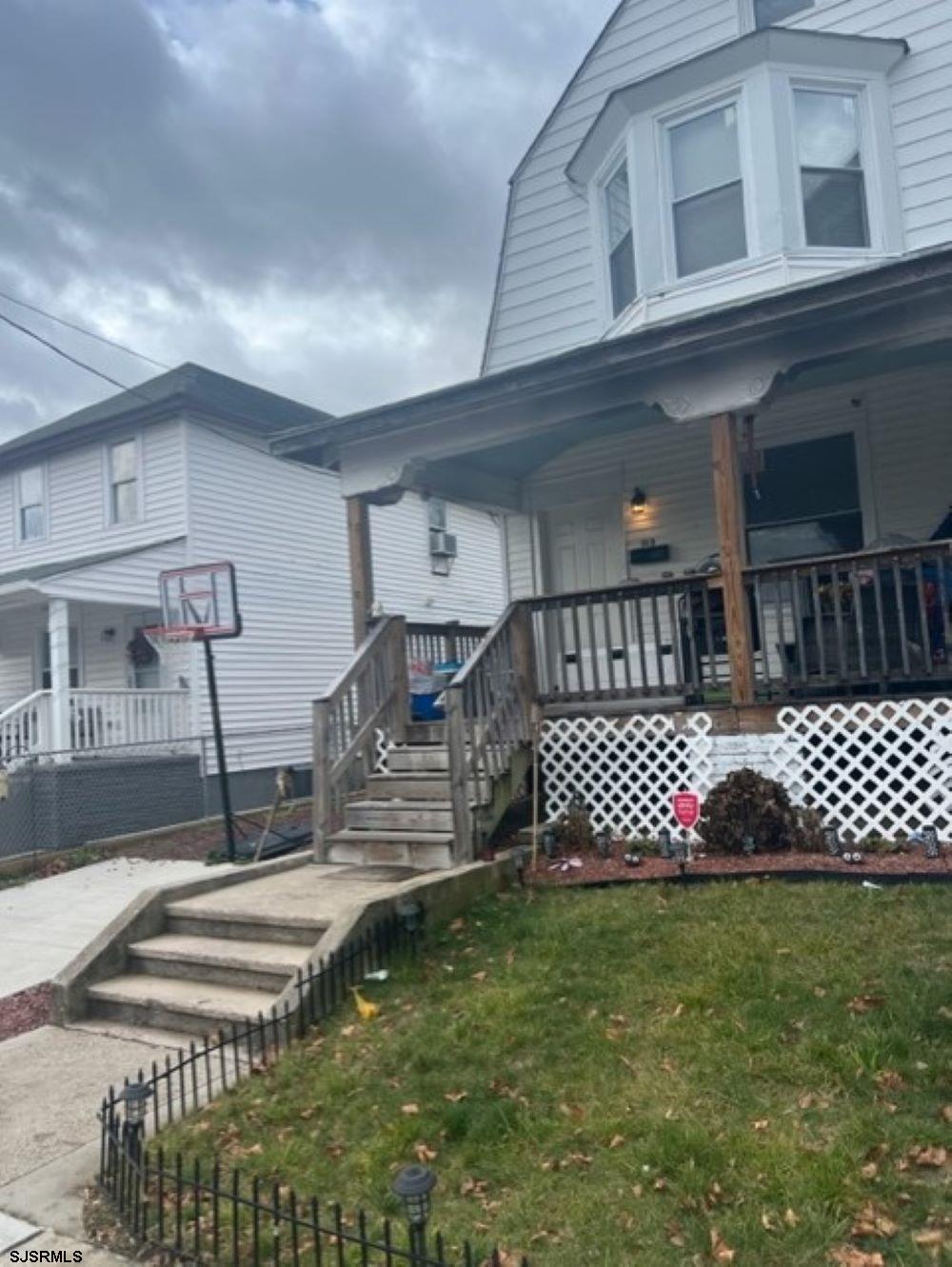 113 South Chester Avenue Pleasantville, NJ 08232 - Photo 2 of 7 a front view of a house with a garden