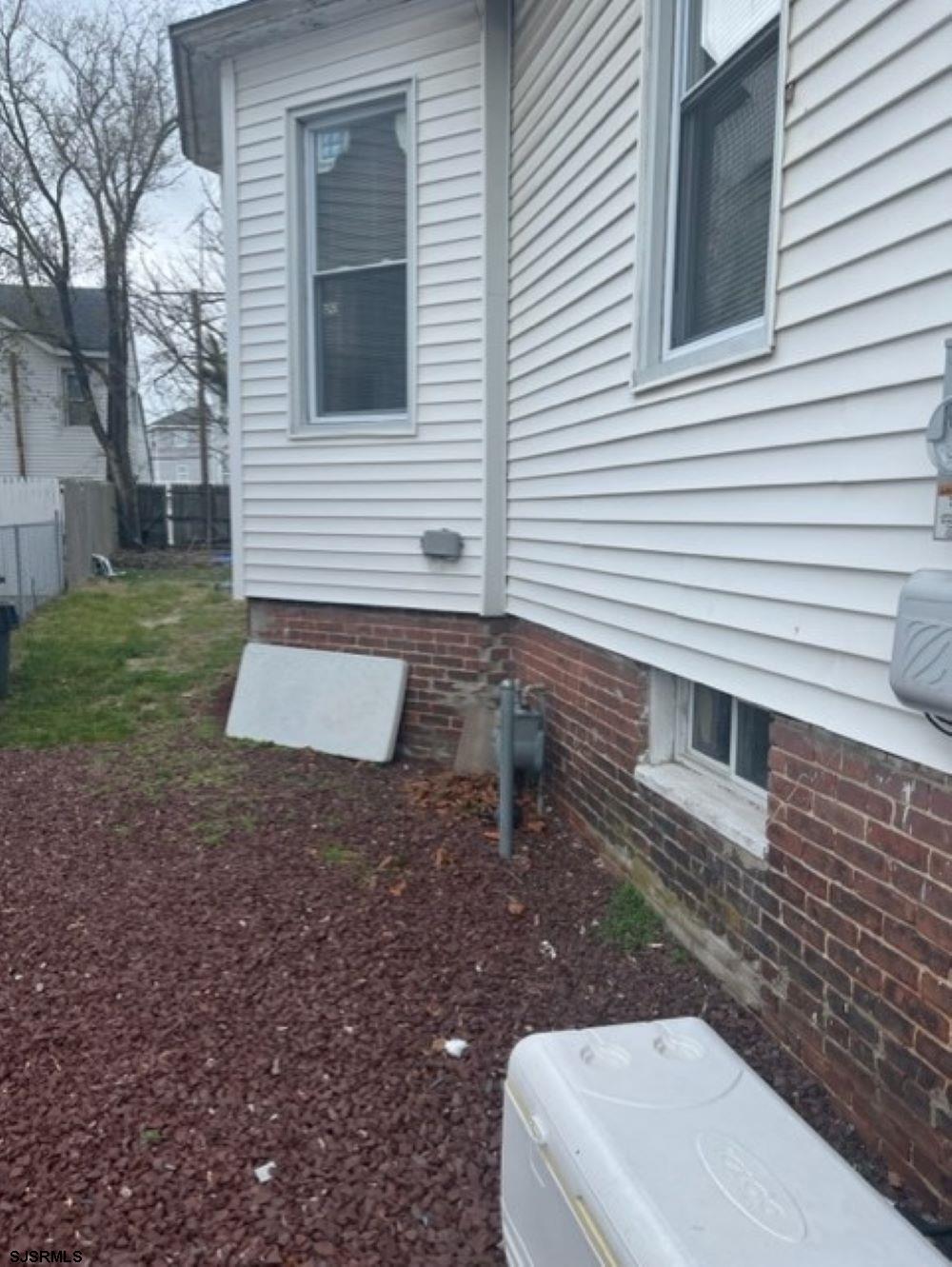 113 South Chester Avenue Pleasantville, NJ 08232 - Photo 6 of 7 a view of a backyard with a house