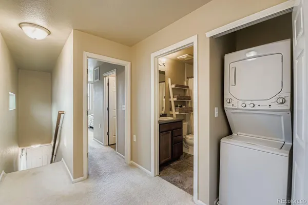 a view of a storage & utility room with washer and dryer
