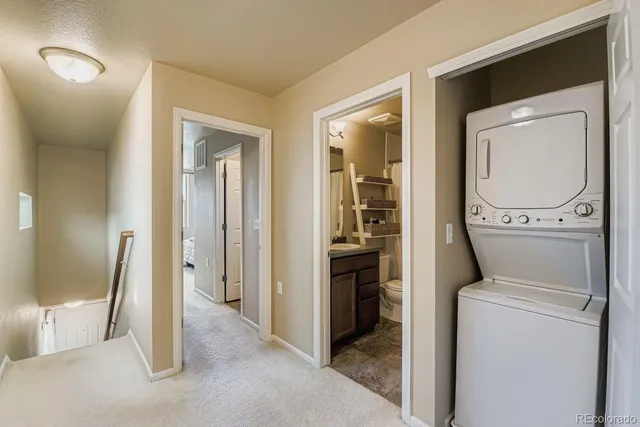 a view of a storage & utility room with washer and dryer
