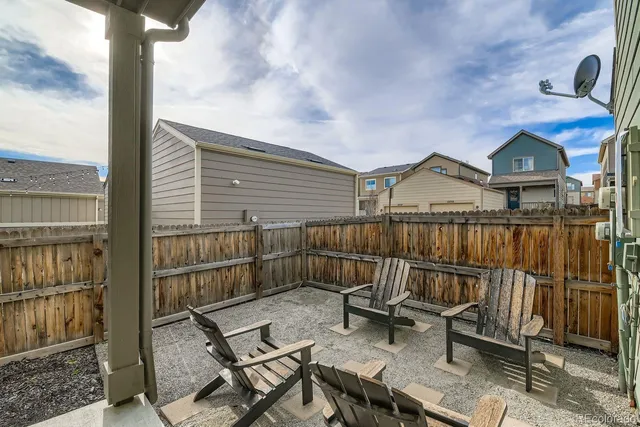 a view of a chairs on the roof deck