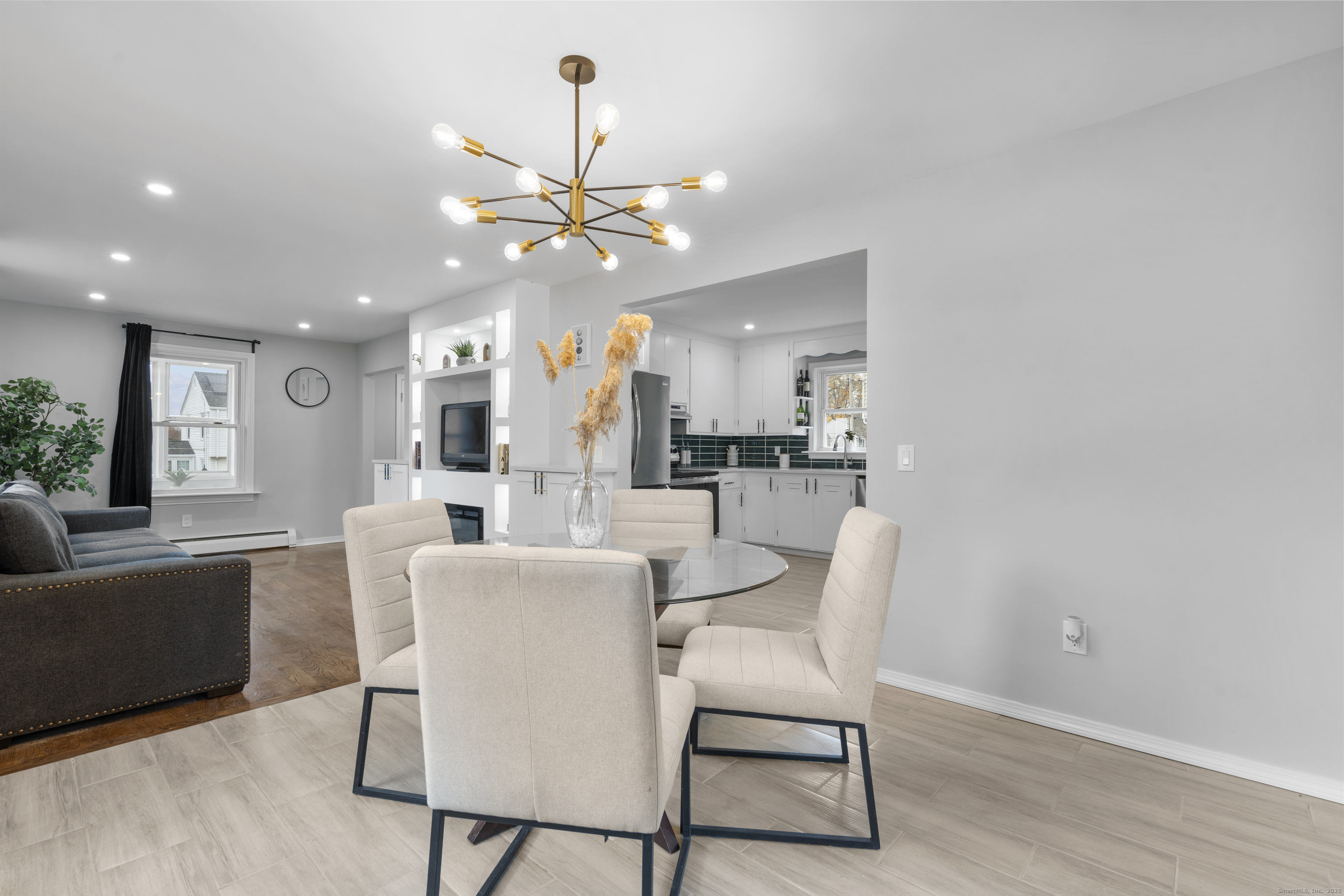 63 Irving Street Manchester, CT 06042 - Photo 11 of 39 a dining room with furniture and window