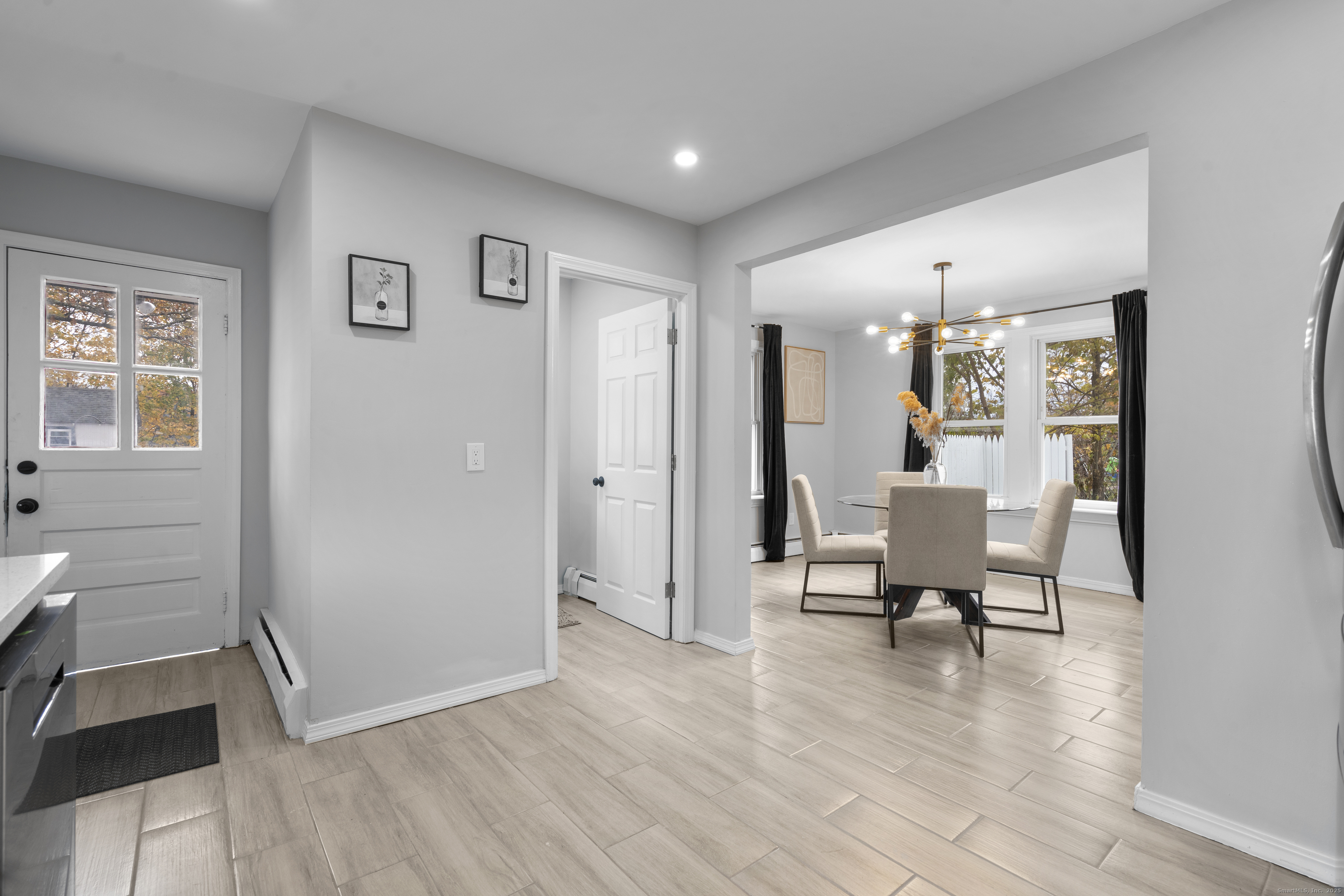 63 Irving Street Manchester, CT 06042 - Photo 15 of 39 a view of a livingroom with furniture and a window