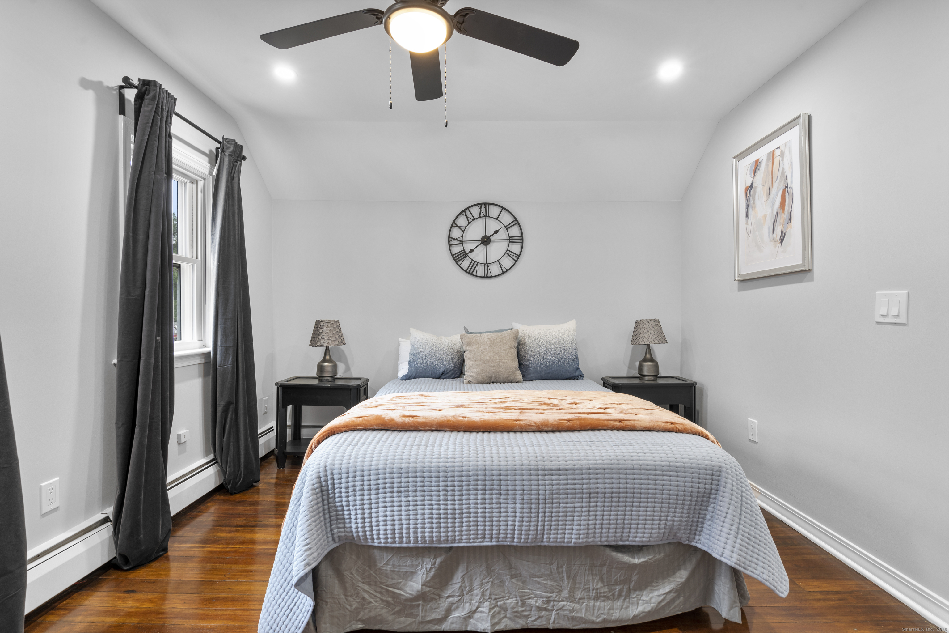 63 Irving Street Manchester, CT 06042 - Photo 20 of 39 a bedroom with a bed and a table