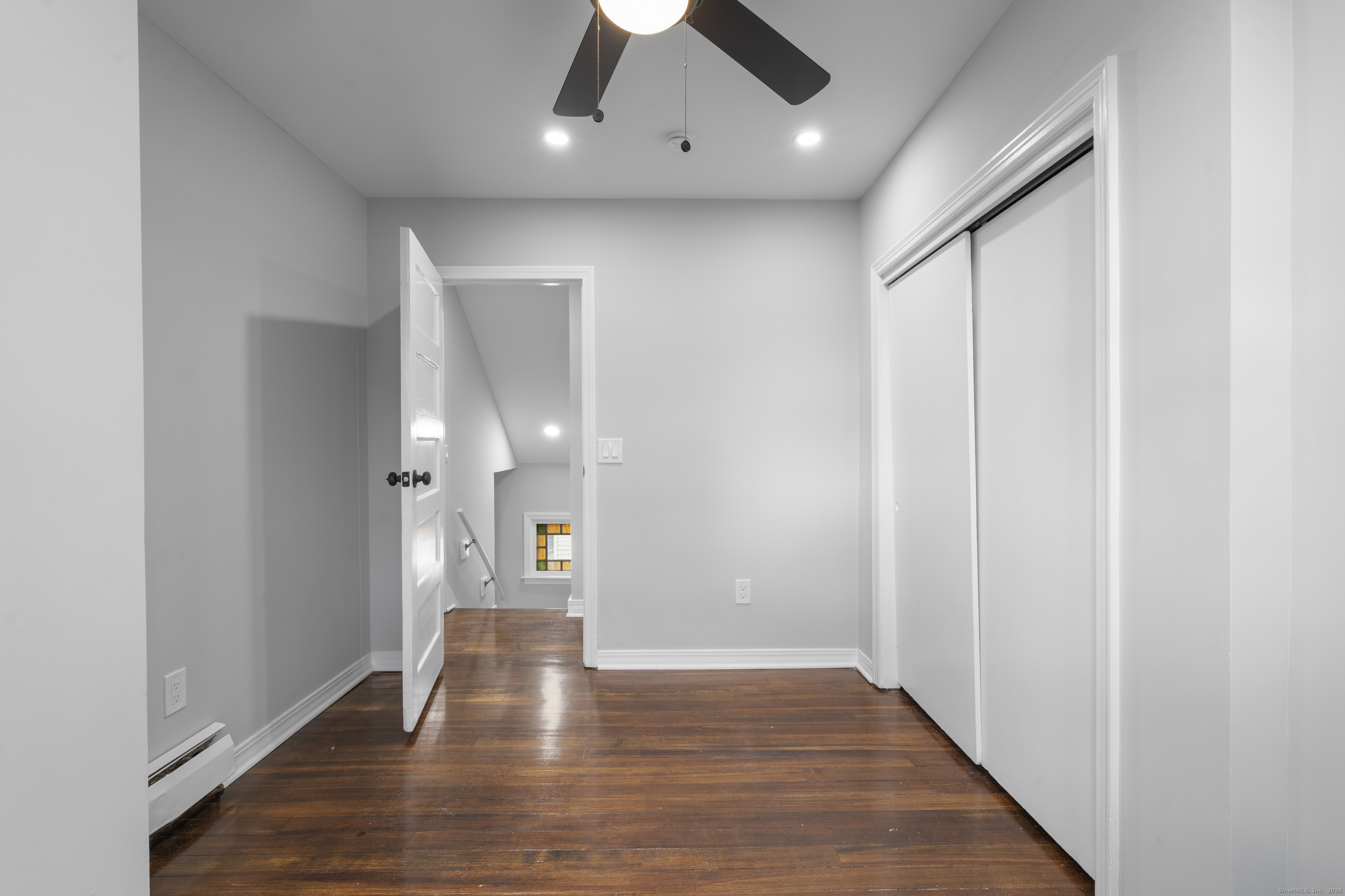 63 Irving Street Manchester, CT 06042 - Photo 23 of 39 a view of empty room with wooden floor