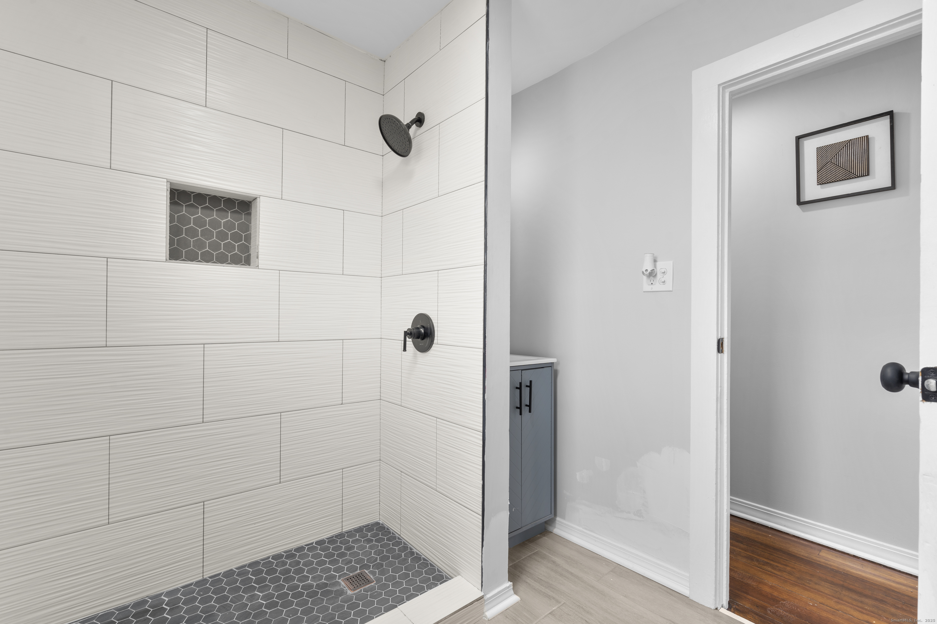 63 Irving Street Manchester, CT 06042 - Photo 28 of 39 a bathroom with a shower