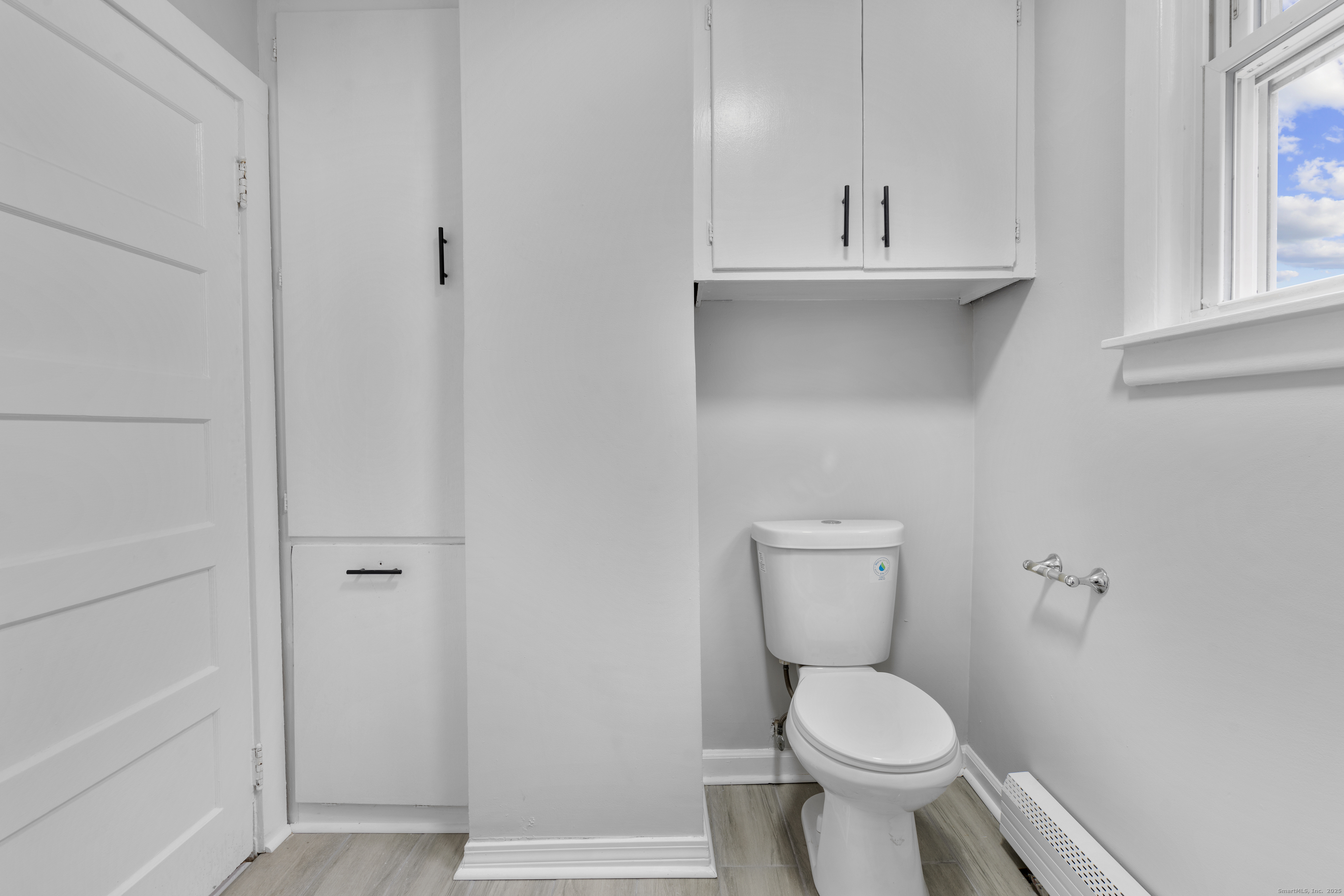 63 Irving Street Manchester, CT 06042 - Photo 29 of 39 a bathroom with a toilet