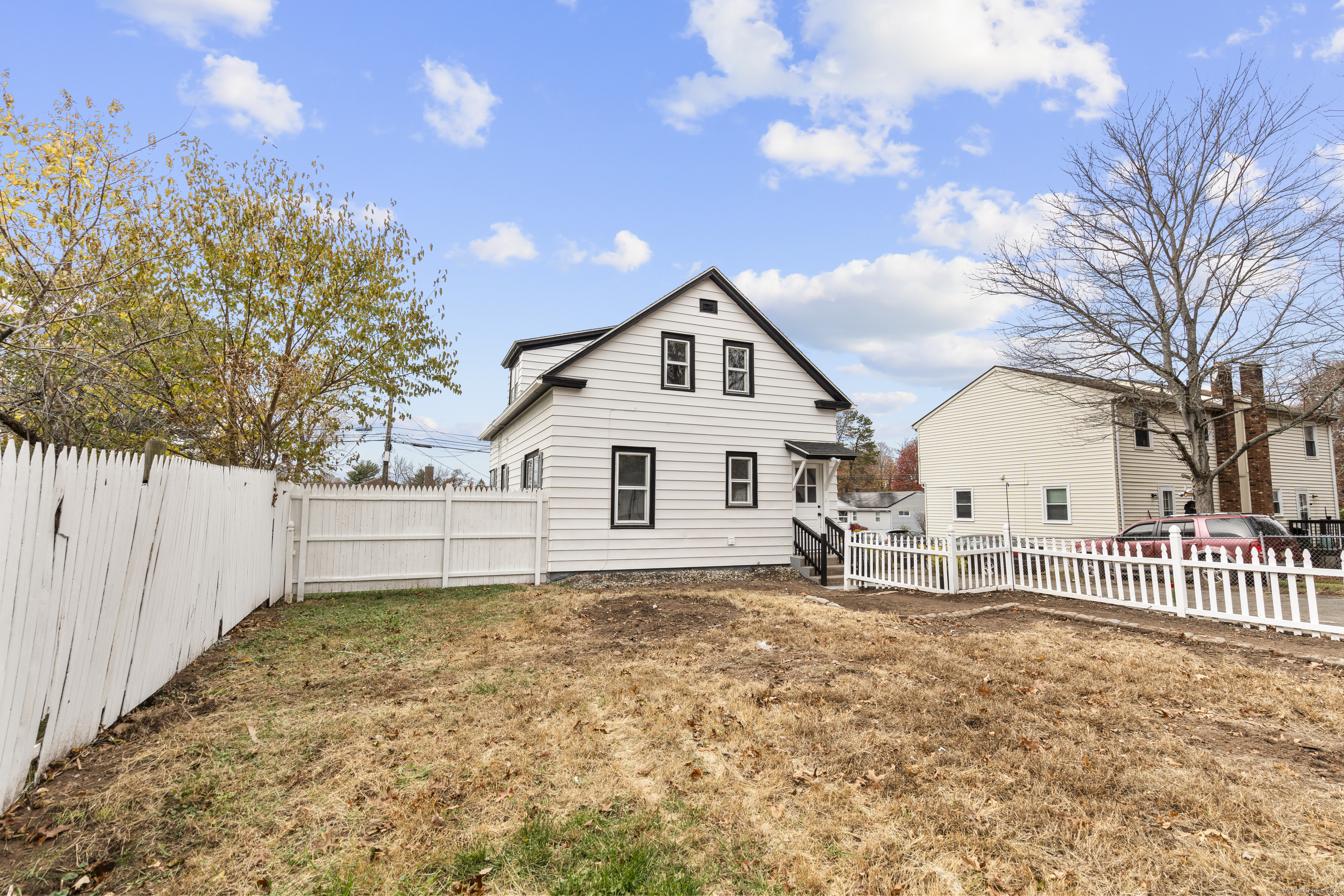 63 Irving Street Manchester, CT 06042 - Photo 36 of 39 a view of a house with a yard