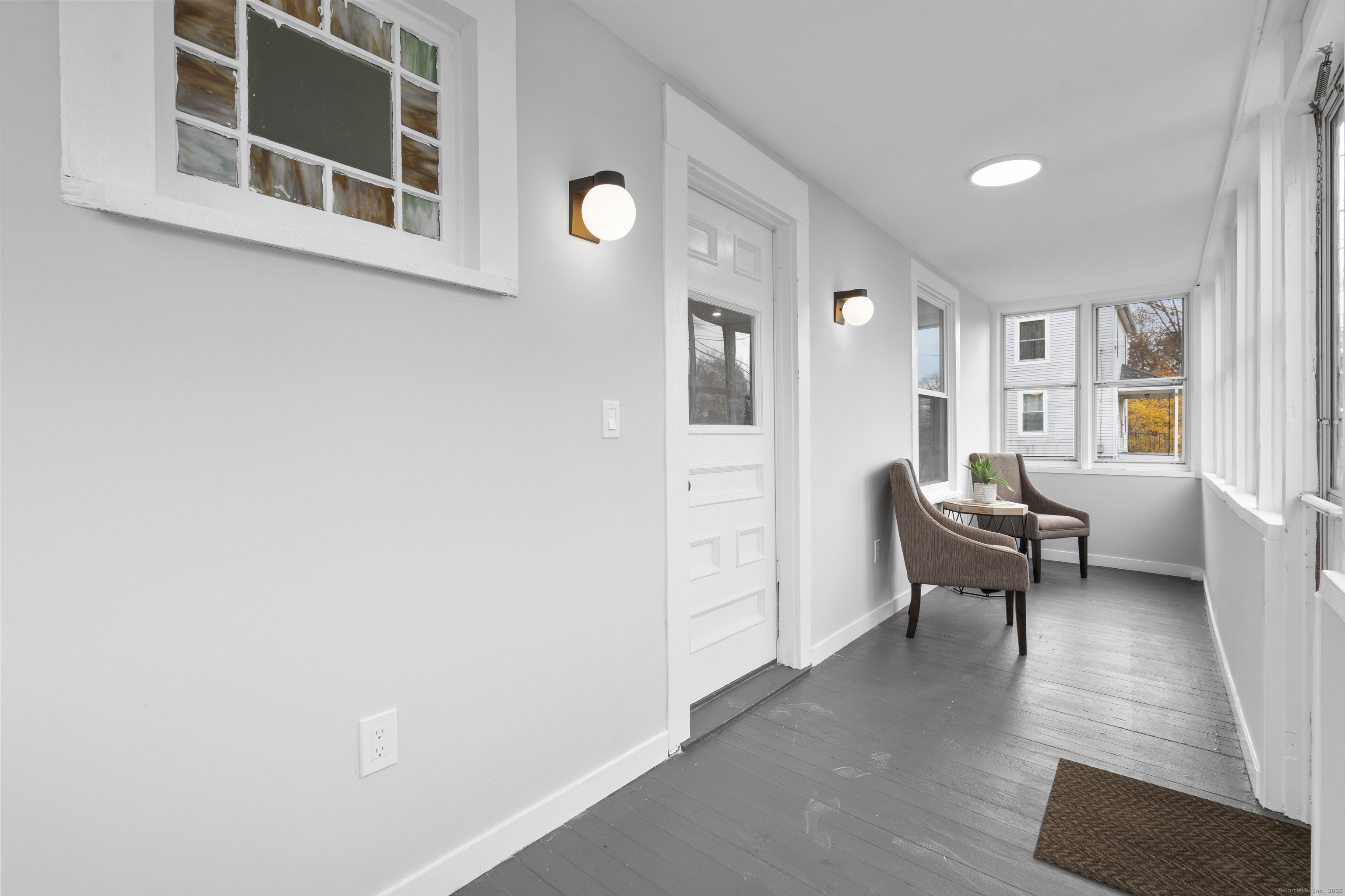 63 Irving Street Manchester, CT 06042 - Photo 4 of 39 a living room with furniture and a table