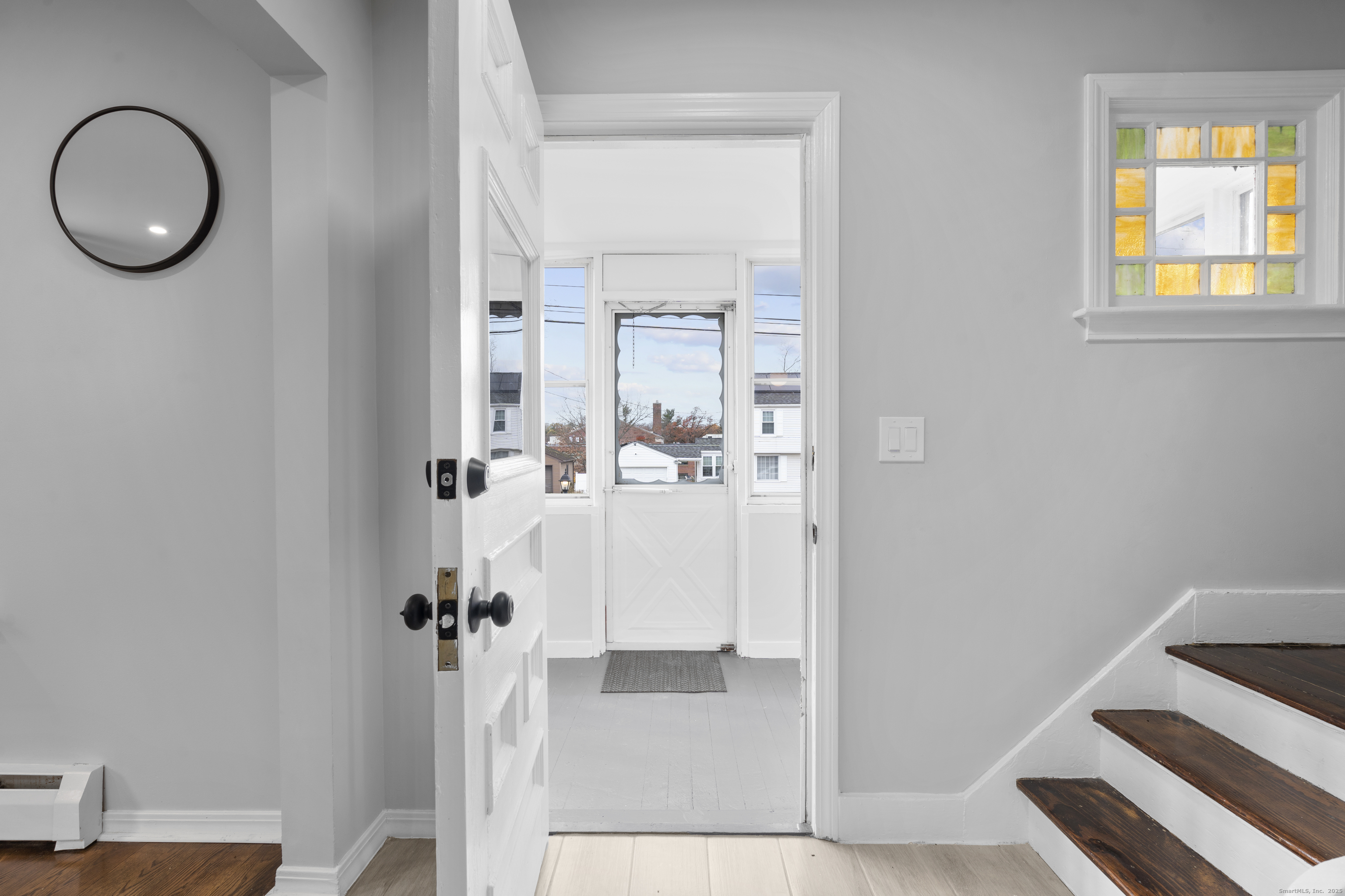 63 Irving Street Manchester, CT 06042 - Photo 5 of 39 a view of living room and window