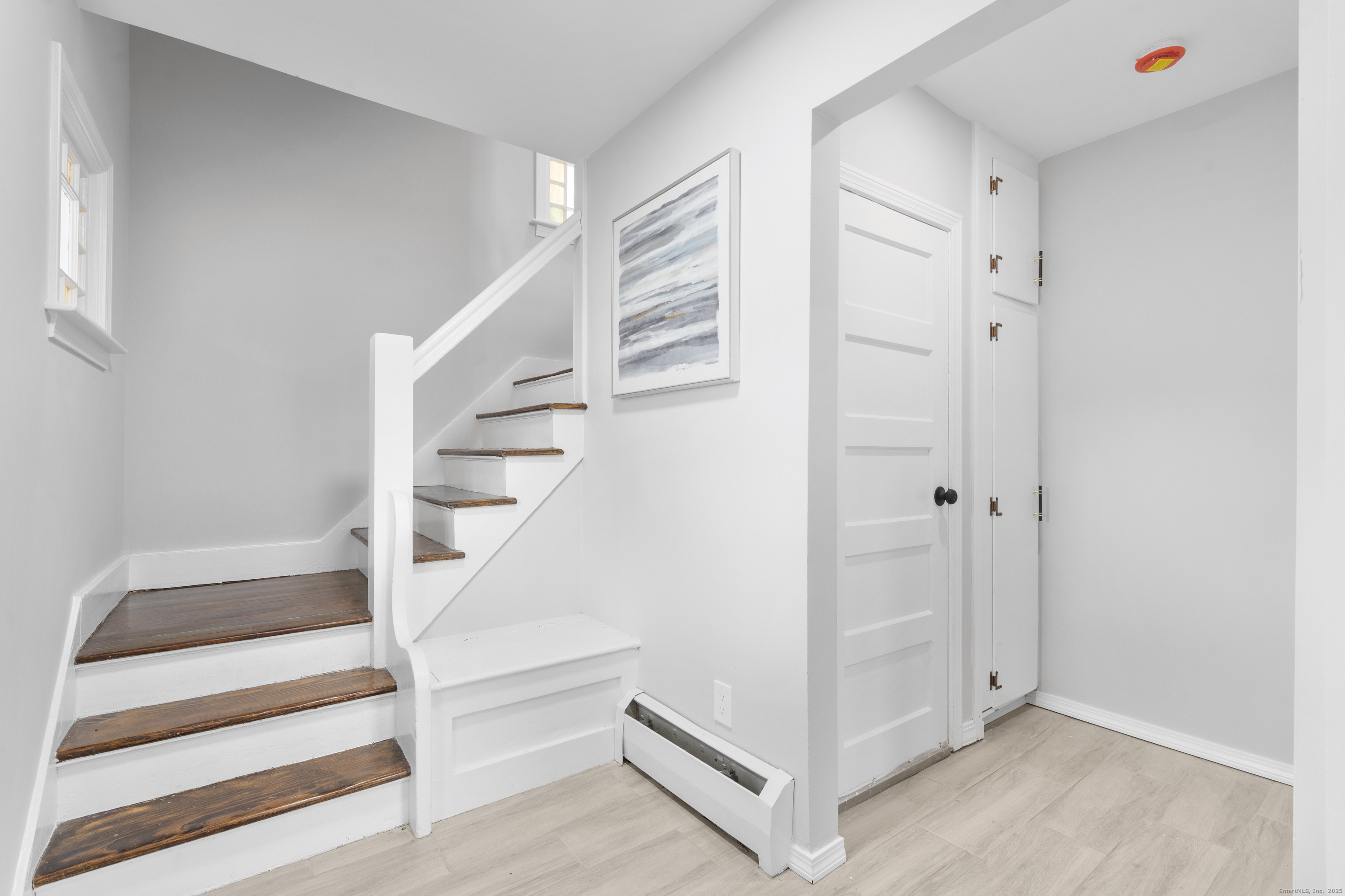 63 Irving Street Manchester, CT 06042 - Photo 6 of 39 a view of an empty room with stairs