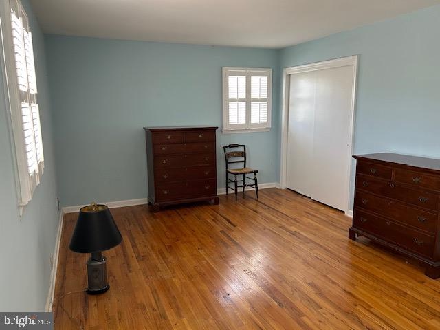 484 Flock Road Hamilton, NJ 08619 - Photo 13 of 25 a view of empty room with wooden floor and fan