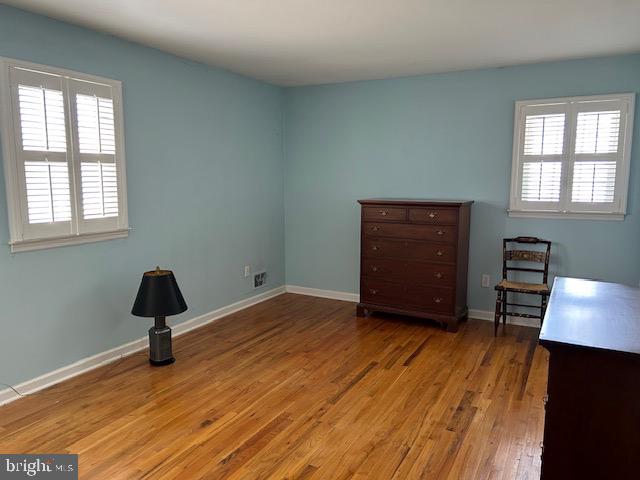 484 Flock Road Hamilton, NJ 08619 - Photo 14 of 25 a room with a window and wooden floor