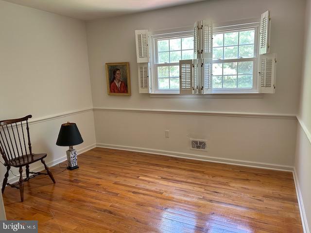 484 Flock Road Hamilton, NJ 08619 - Photo 19 of 25 a view of a workspace with wooden floor and a window