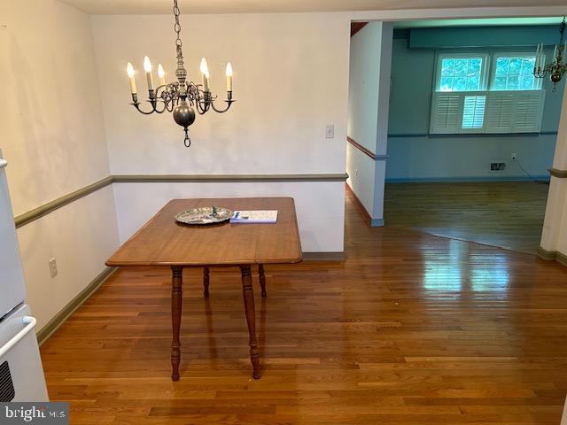 484 Flock Road Hamilton, NJ 08619 - Photo 6 of 25 a view of a room with wooden floor chandelier and entryway