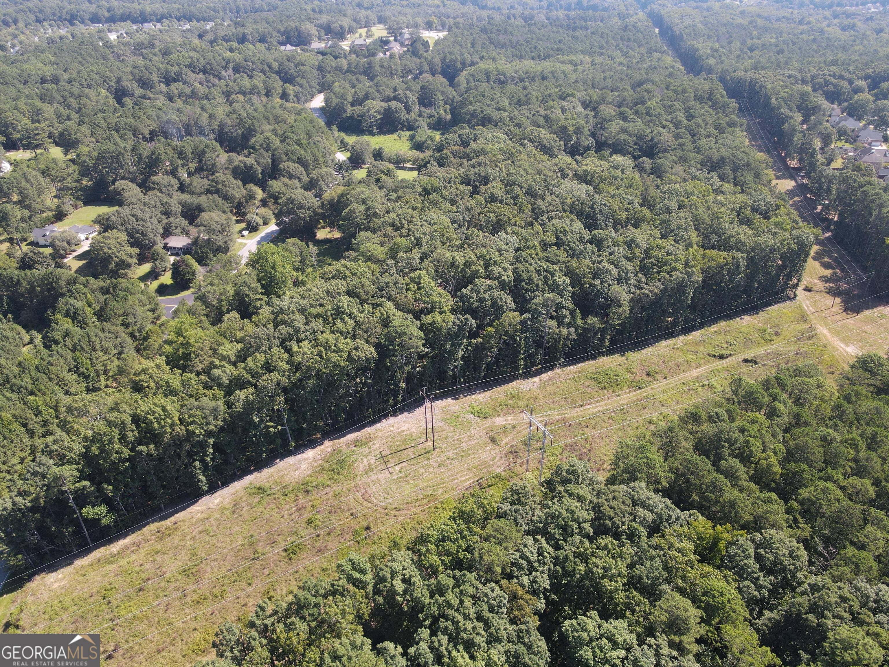 2578 Temple Johnson Road Snellville, GA 30078 - Photo 4 of 18 a view of a road from a yard