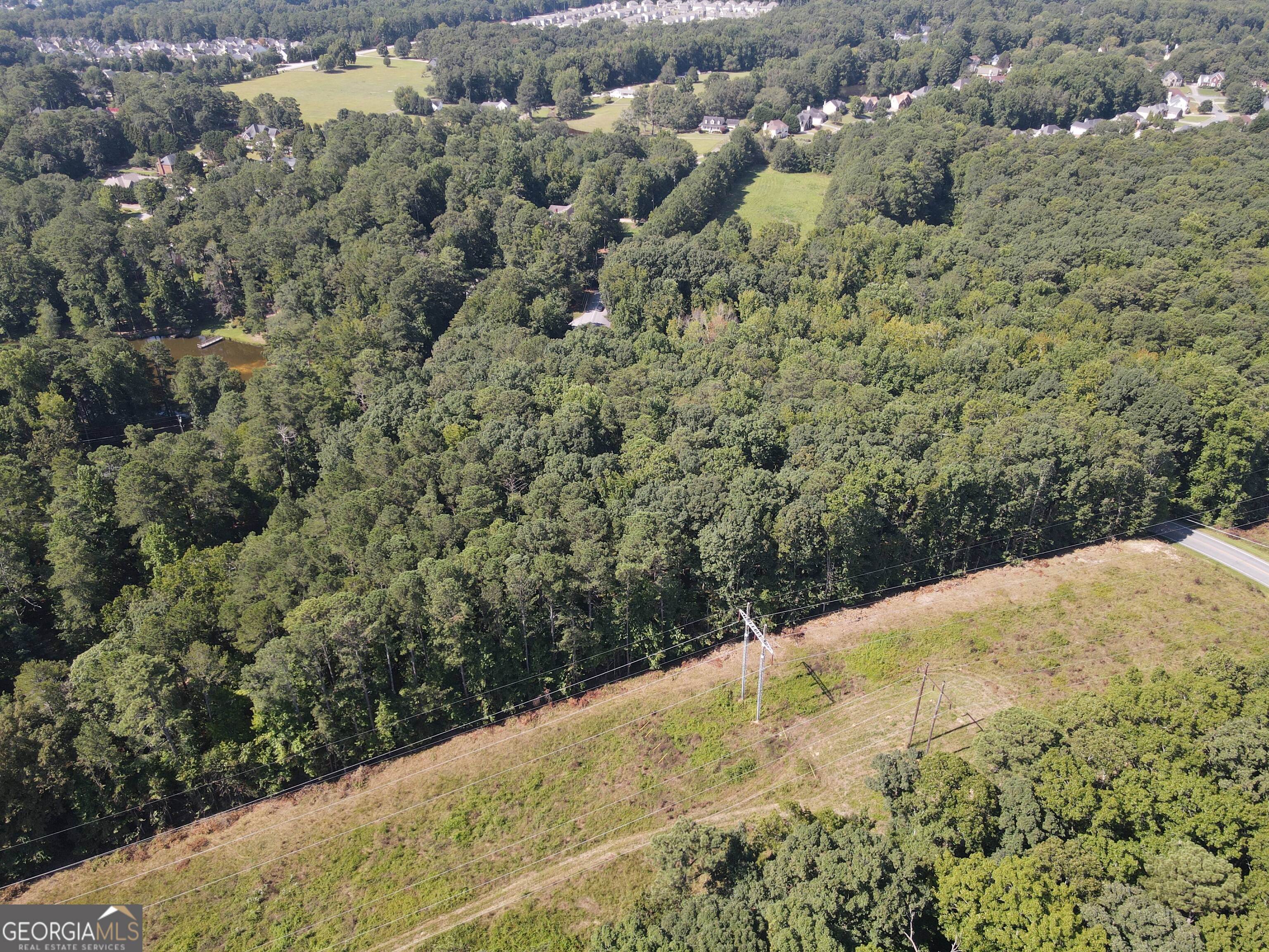 2578 Temple Johnson Road Snellville, GA 30078 - Photo 5 of 18 a view of a road from a yard