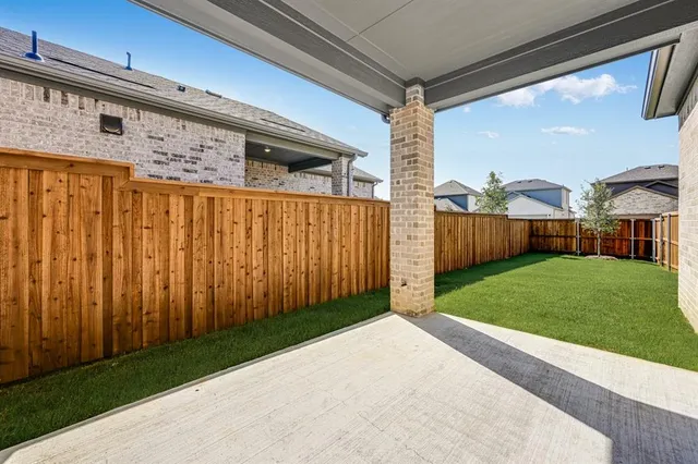 a view of a porch with a backyard