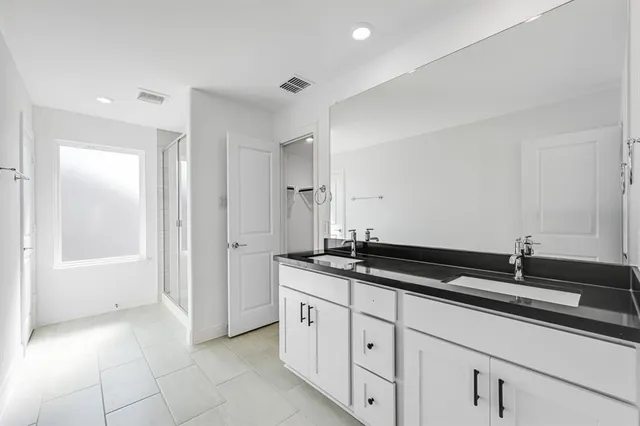 a utility room with cabinets