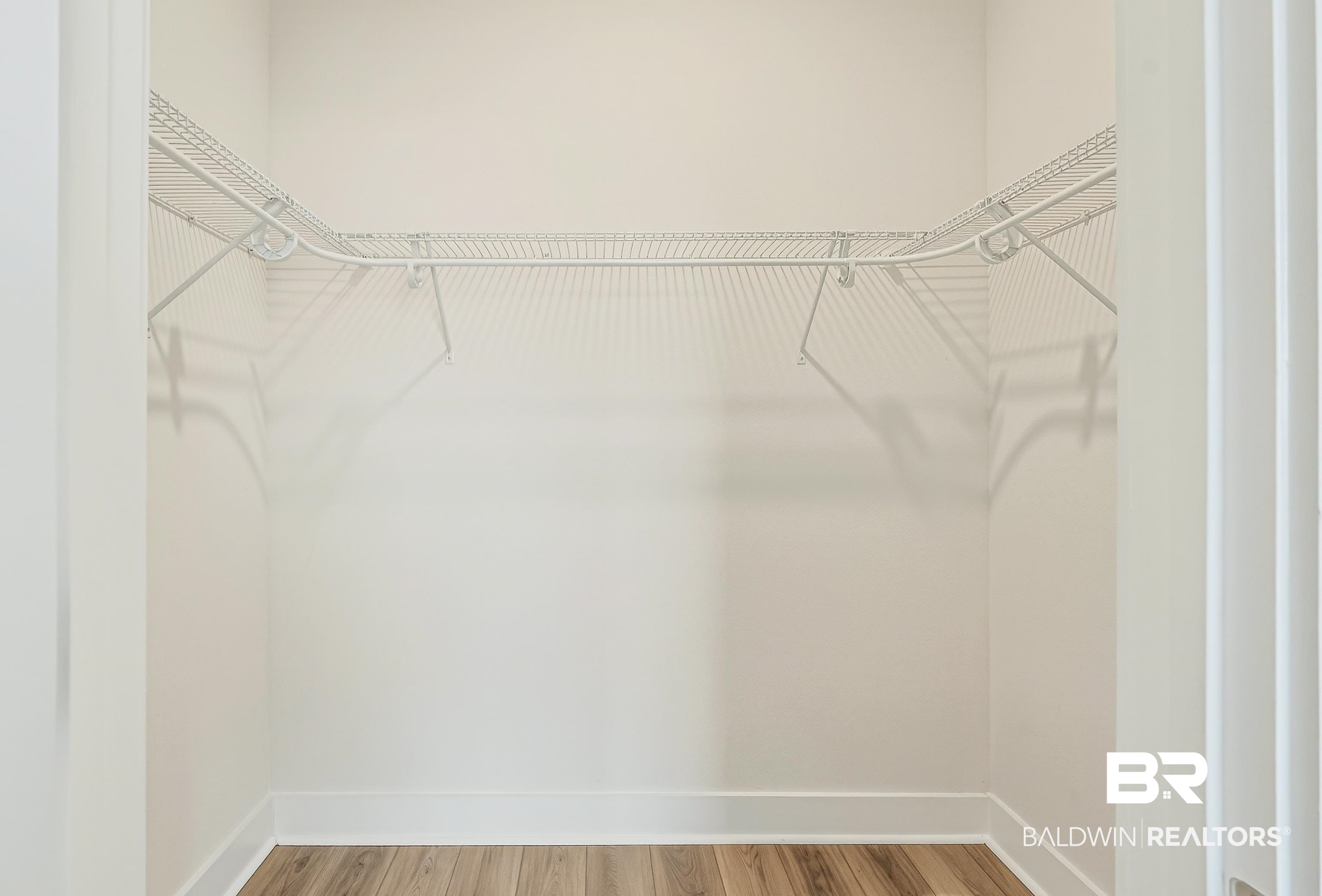 1728 Partridge Street Foley, AL 36535 - Photo 29 of 37 Walk in closet with wood finished floors