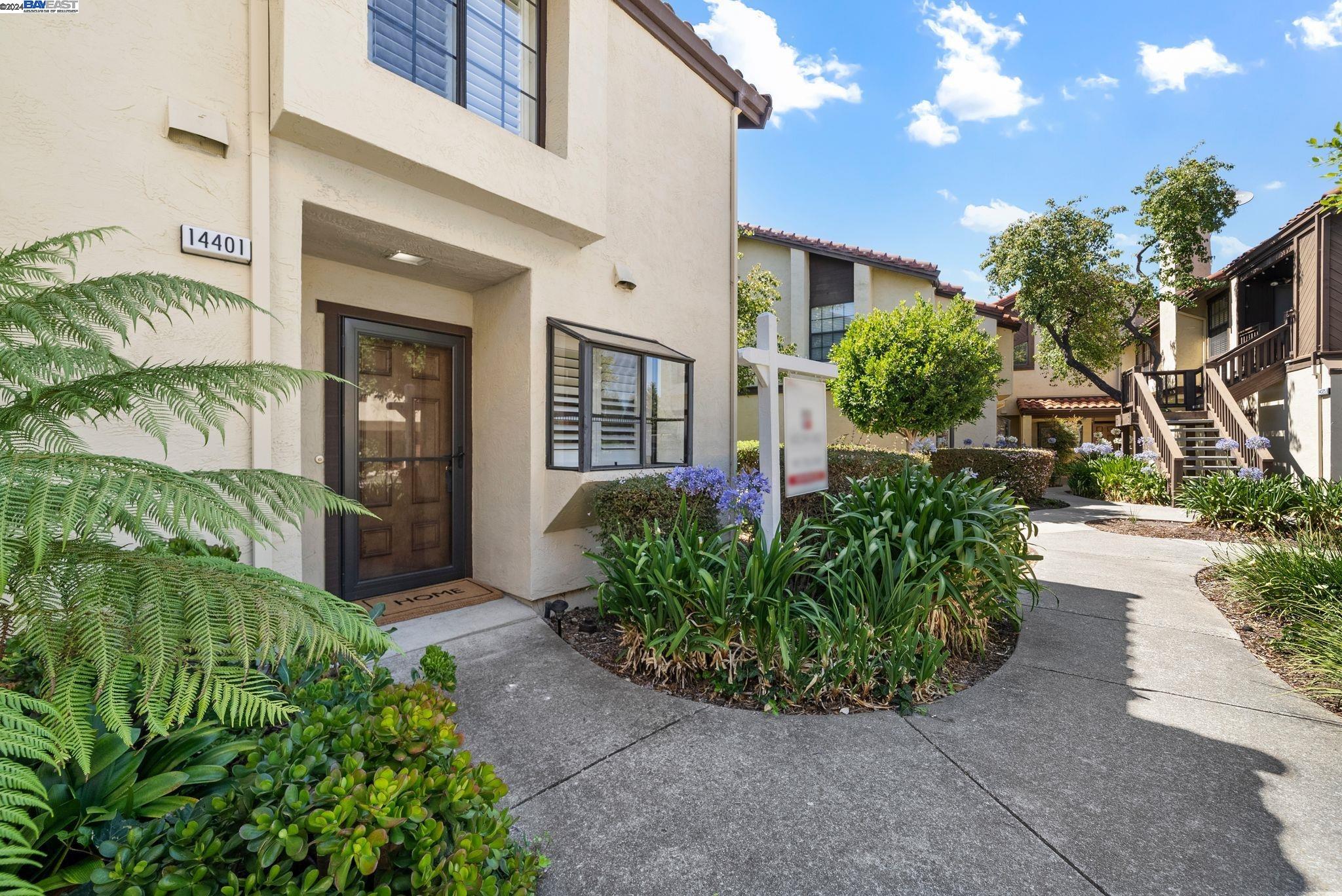 a view of a garden with potted plants