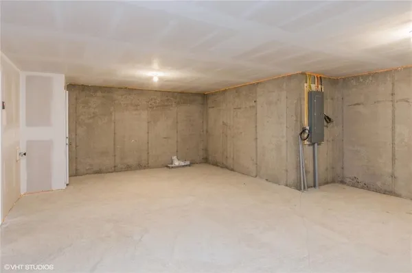 a utility room with washing machine