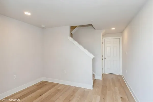 a view of hallway with stairs