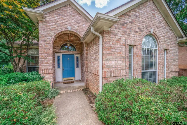 a view of entrance gate of a house