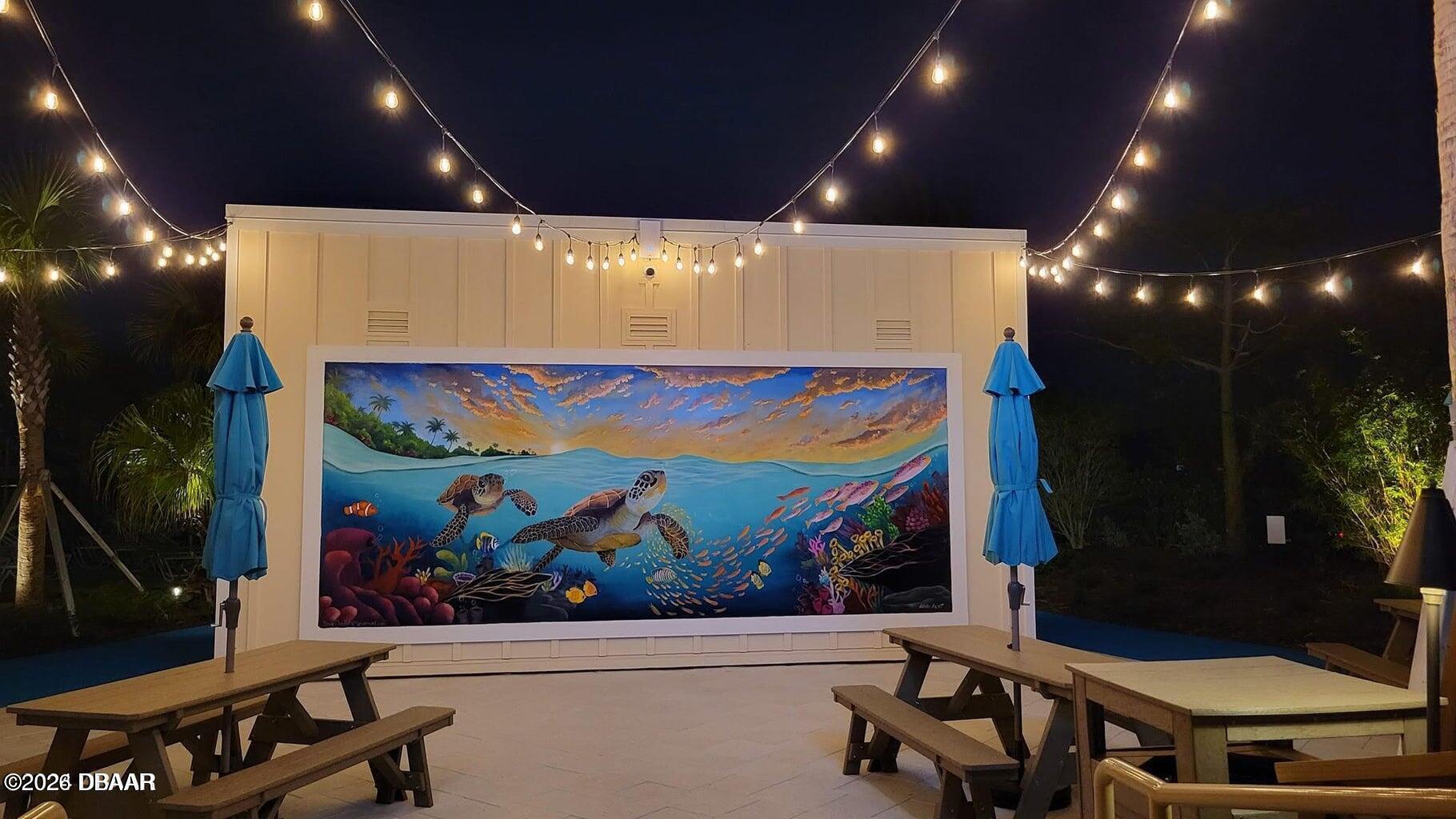 533 Margaritaville Avenue Daytona Beach, FL 32124 - Photo 43 of 43 a room with furniture and screen