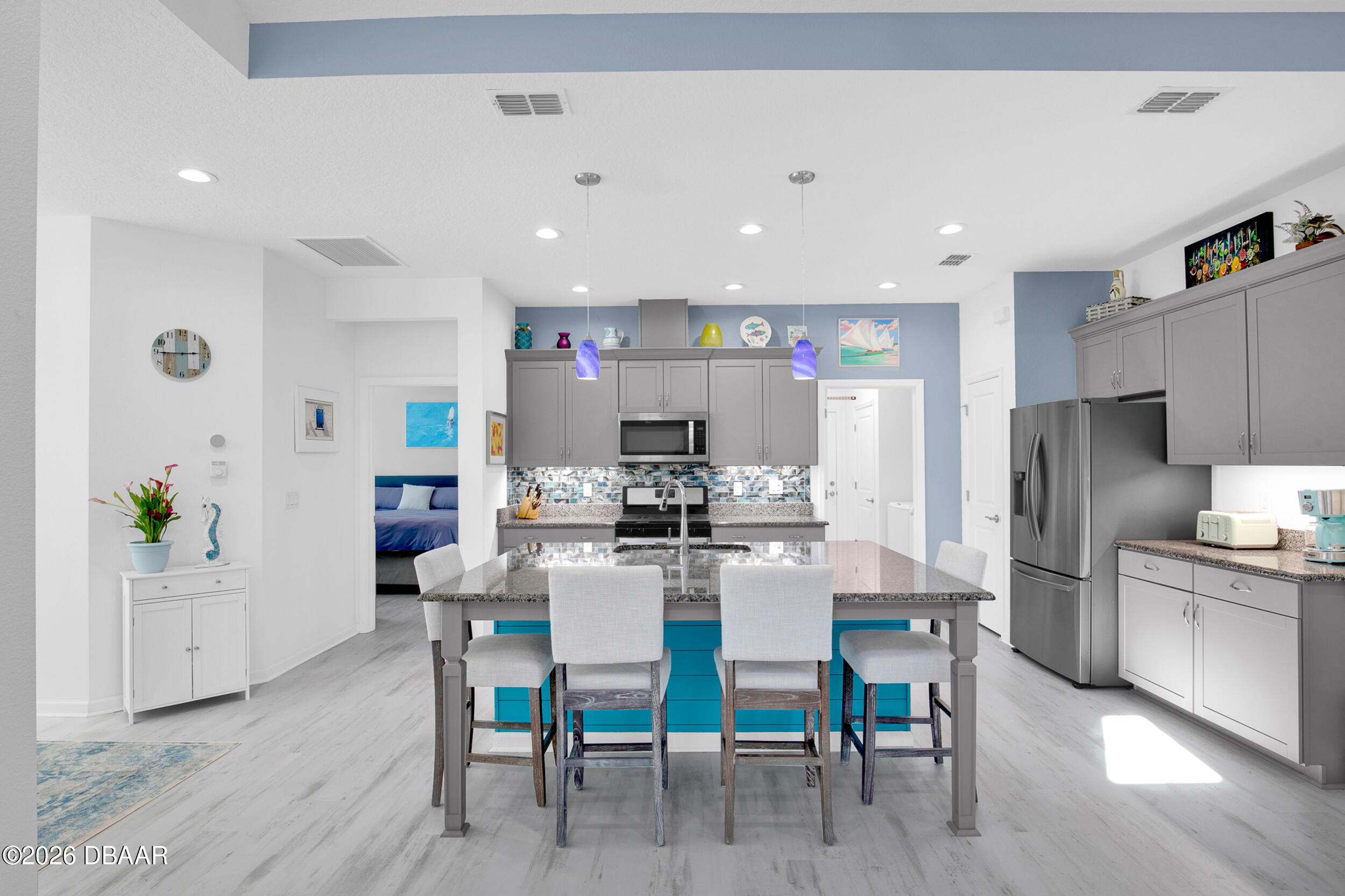 533 Margaritaville Avenue Daytona Beach, FL 32124 - Photo 6 of 43 a view of a dining room with furniture