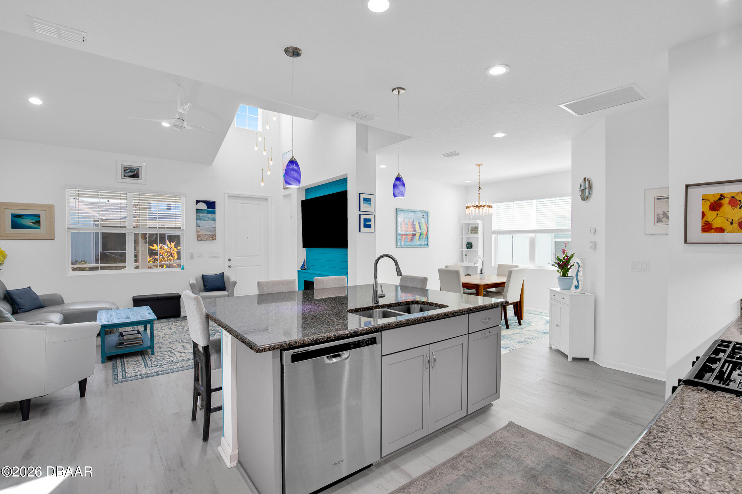 533 Margaritaville Avenue Daytona Beach, FL 32124 - Photo 8 of 43 a kitchen that has a sink and a stove in it