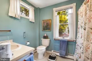 a view of a patio with table and chairs and potted plants
