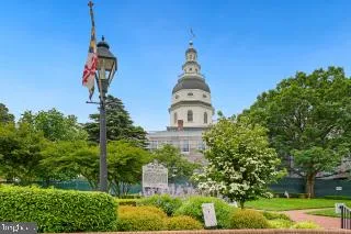 a view of a cafe with sitting area