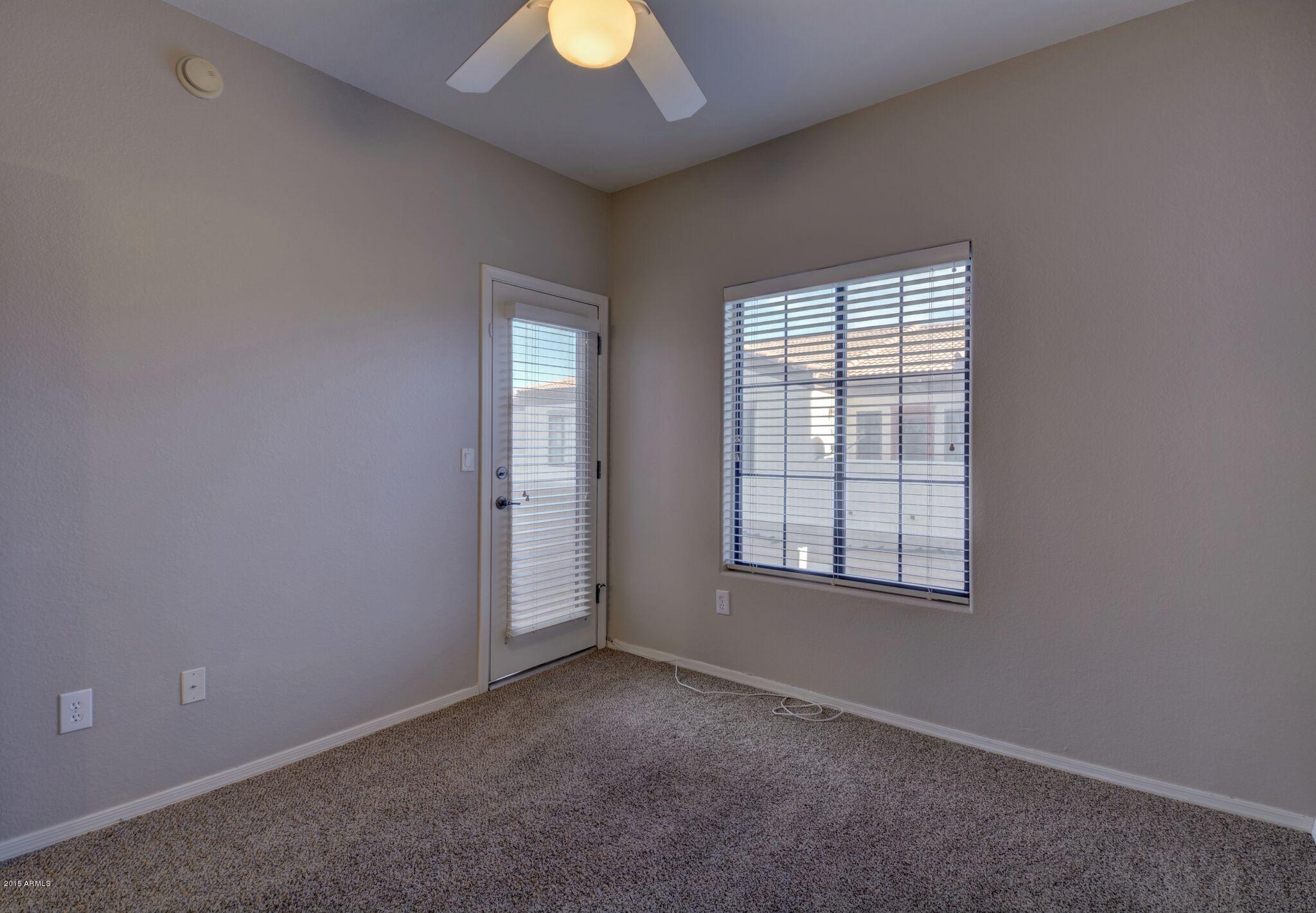 3150 East Beardsley Road, Unit 1028 Phoenix, AZ 85050 - Photo 20 of 29 Bedroom 2 exit to Balcony