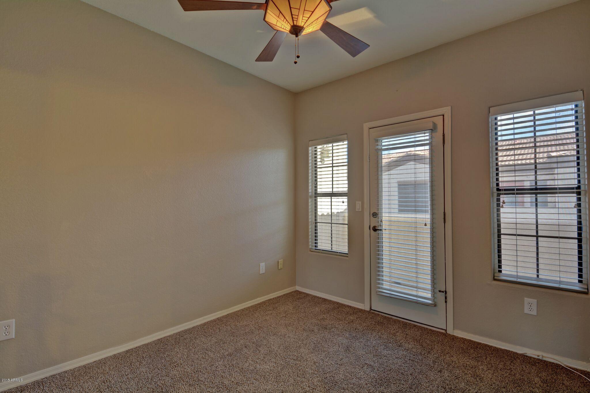 3150 East Beardsley Road, Unit 1028 Phoenix, AZ 85050 - Photo 24 of 29 Bedroom 3 with exit to Balcony