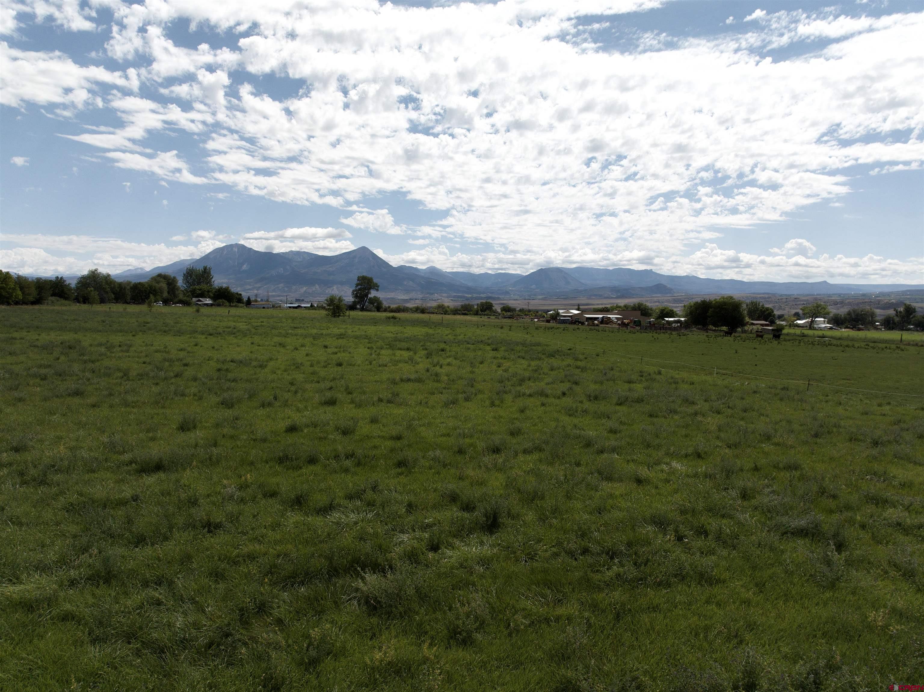 9627 3200th Road Hotchkiss, CO 81419 - Photo 12 of 44 a view of an ocean and a mountain