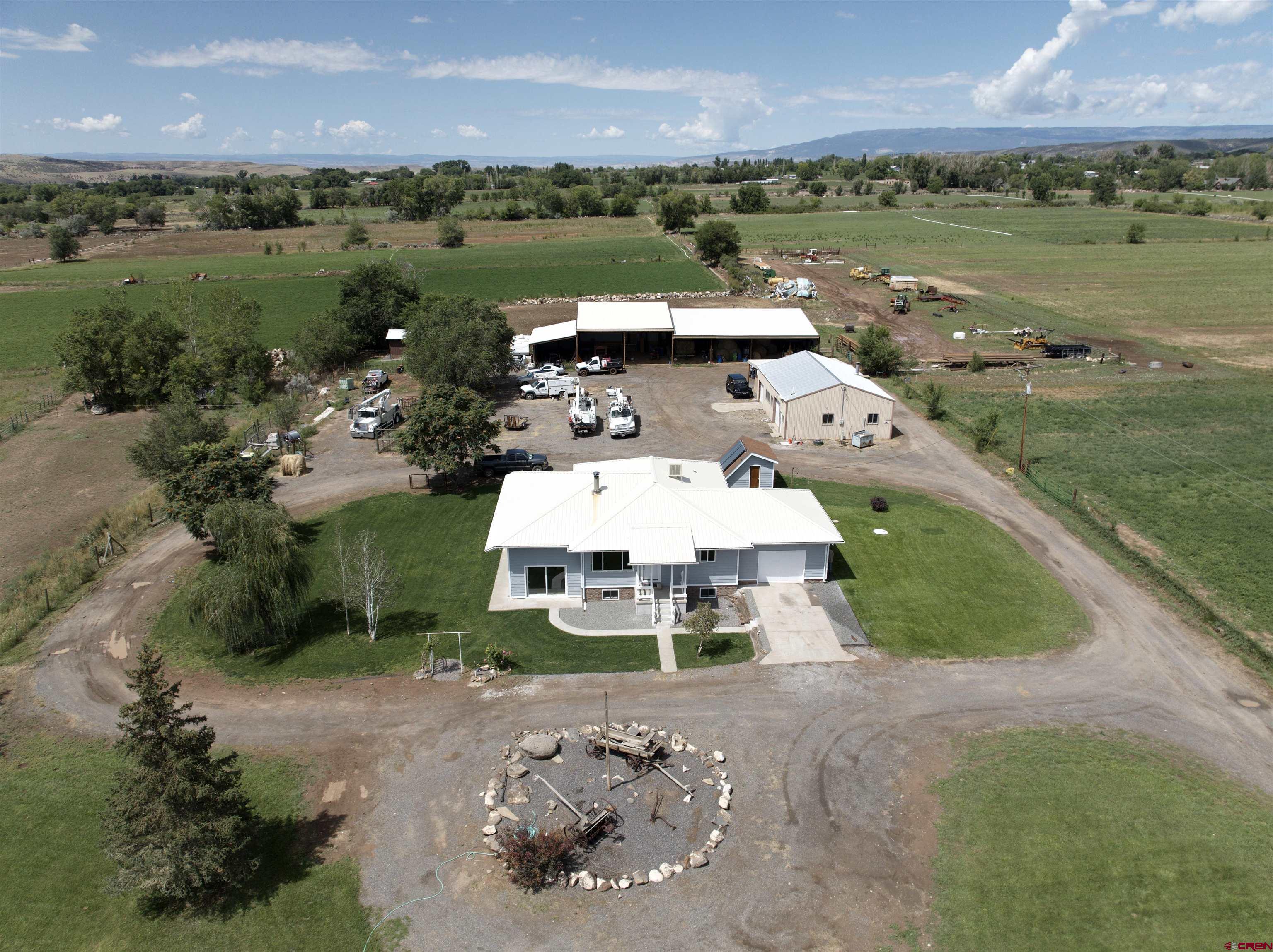 9627 3200th Road Hotchkiss, CO 81419 - Photo 2 of 44 an aerial view of a house with garden space and houses with outdoor space