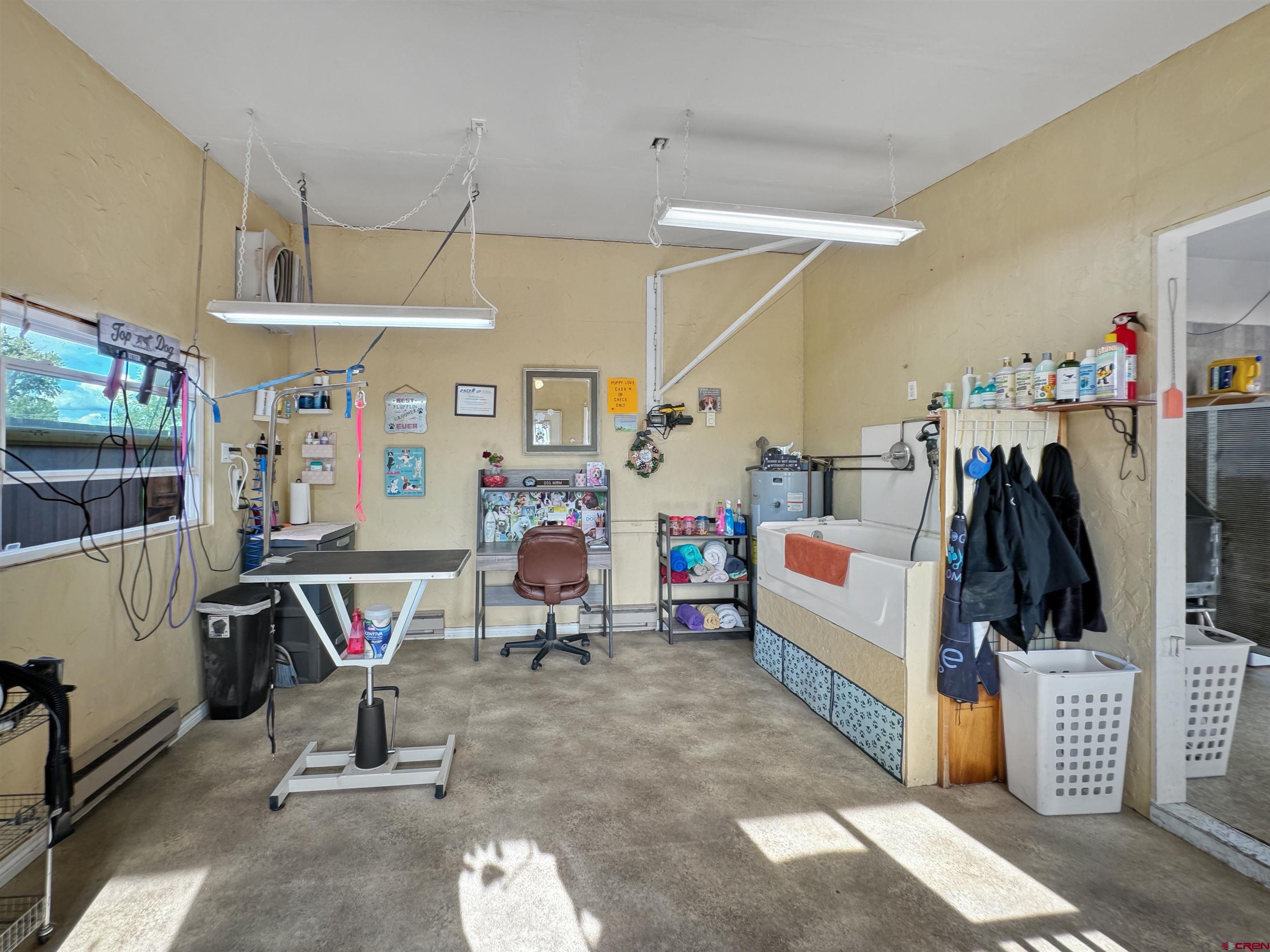 9627 3200th Road Hotchkiss, CO 81419 - Photo 37 of 44 a view of a room with lots of stuff