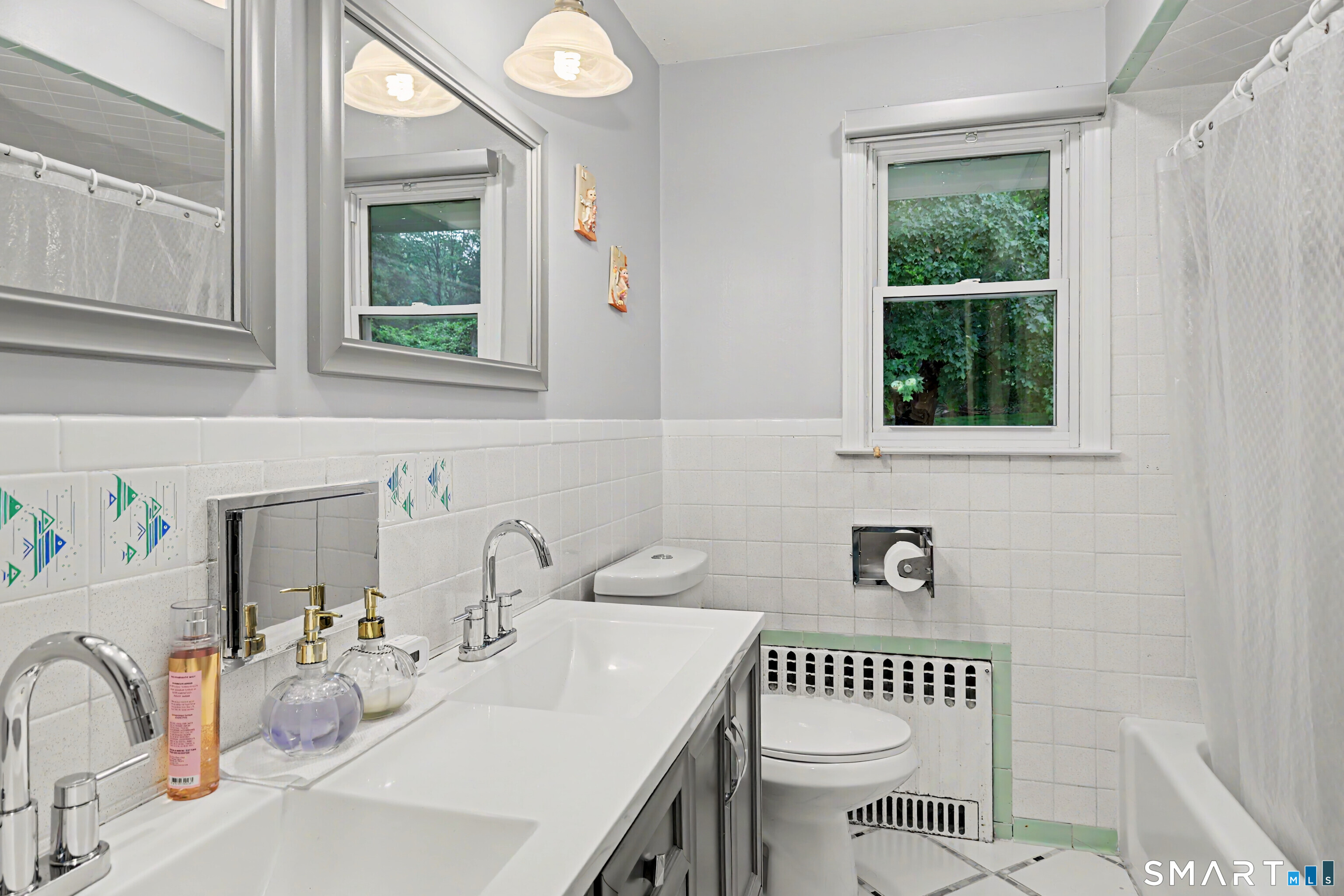 44 Haverhill Road Trumbull, CT 06611 - Photo 21 of 32 a bathroom with a sink and a toilet
