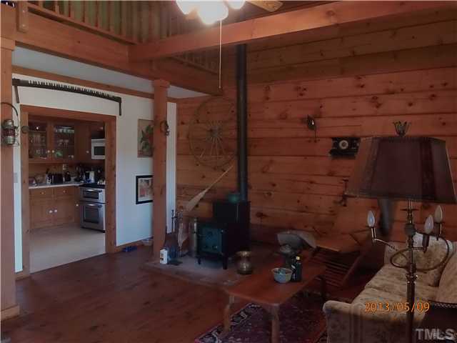 8724 Flower Hill Road Middlesex, NC 27557 - Photo 21 of 25 family room into kitchen