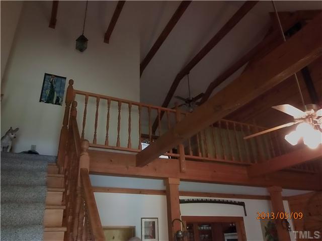 8724 Flower Hill Road Middlesex, NC 27557 - Photo 22 of 25 Gomez (does not convey) protecting the staircase
