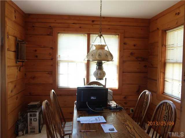 8724 Flower Hill Road Middlesex, NC 27557 - Photo 23 of 25 Dining room with antique light fixture