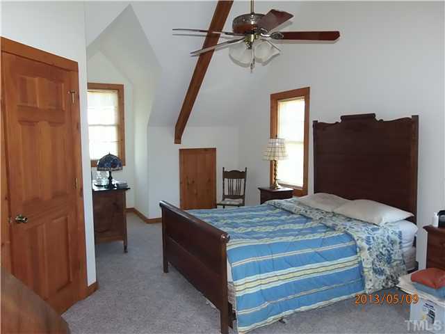 8724 Flower Hill Road Middlesex, NC 27557 - Photo 25 of 25 Master suite with great windows and views.
