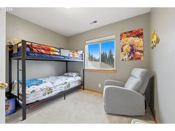 a bedroom with furniture and a couch